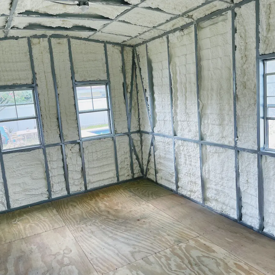 Closed-cell spray foam insulation applied to wall cavities in a residential project in Fort Payne